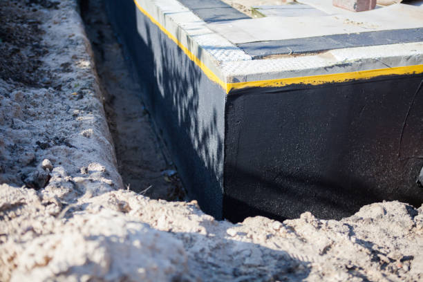 Professional Emergency Waterproofing technician working in Richardsville, VA